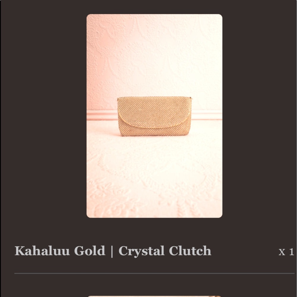 Gold sparkly clutch from Boutique 1861